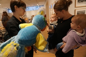 Some of our littlest family members meet our bluest family member, Arturo.